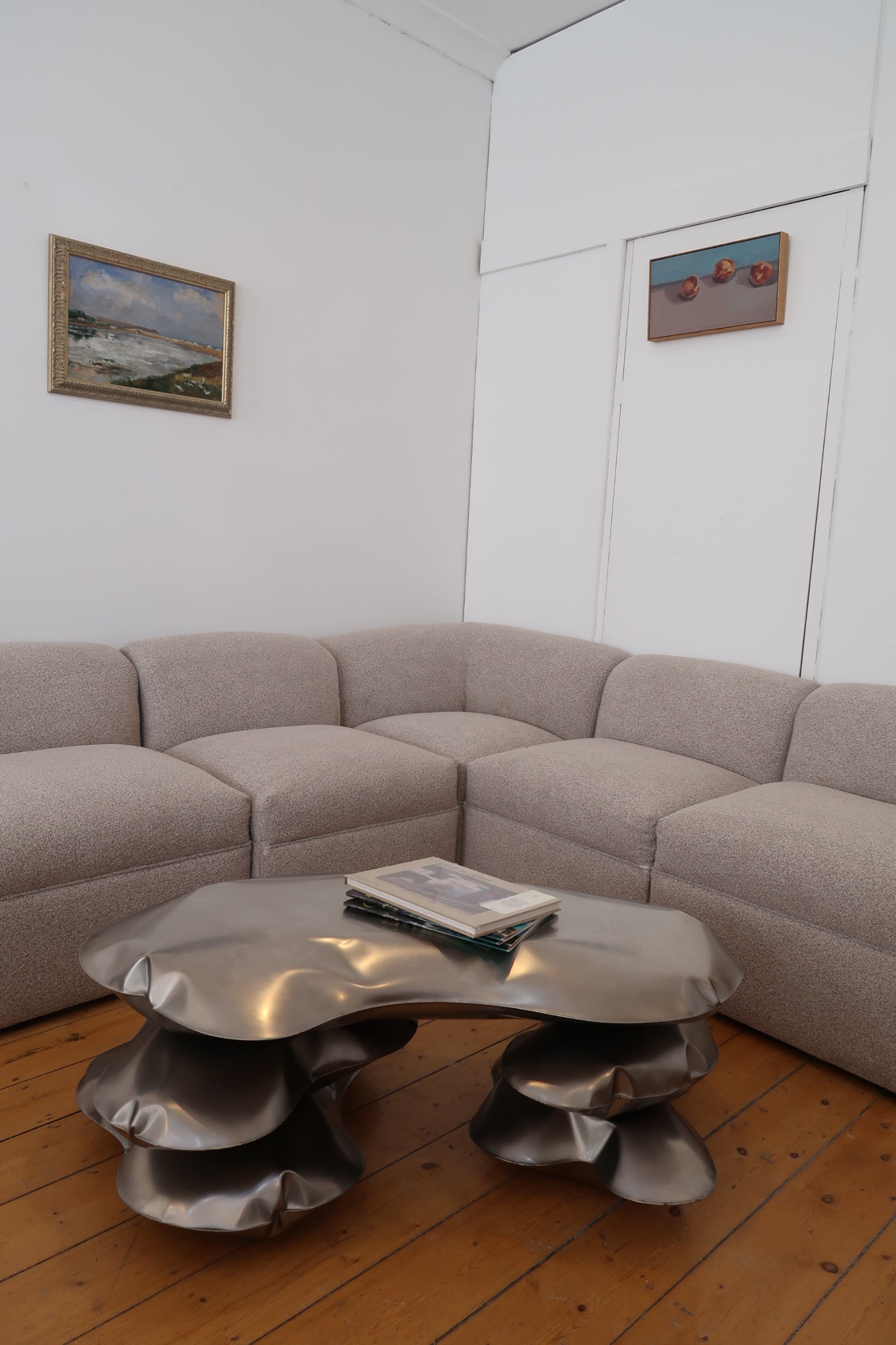 Modern sculptural steel table for living room