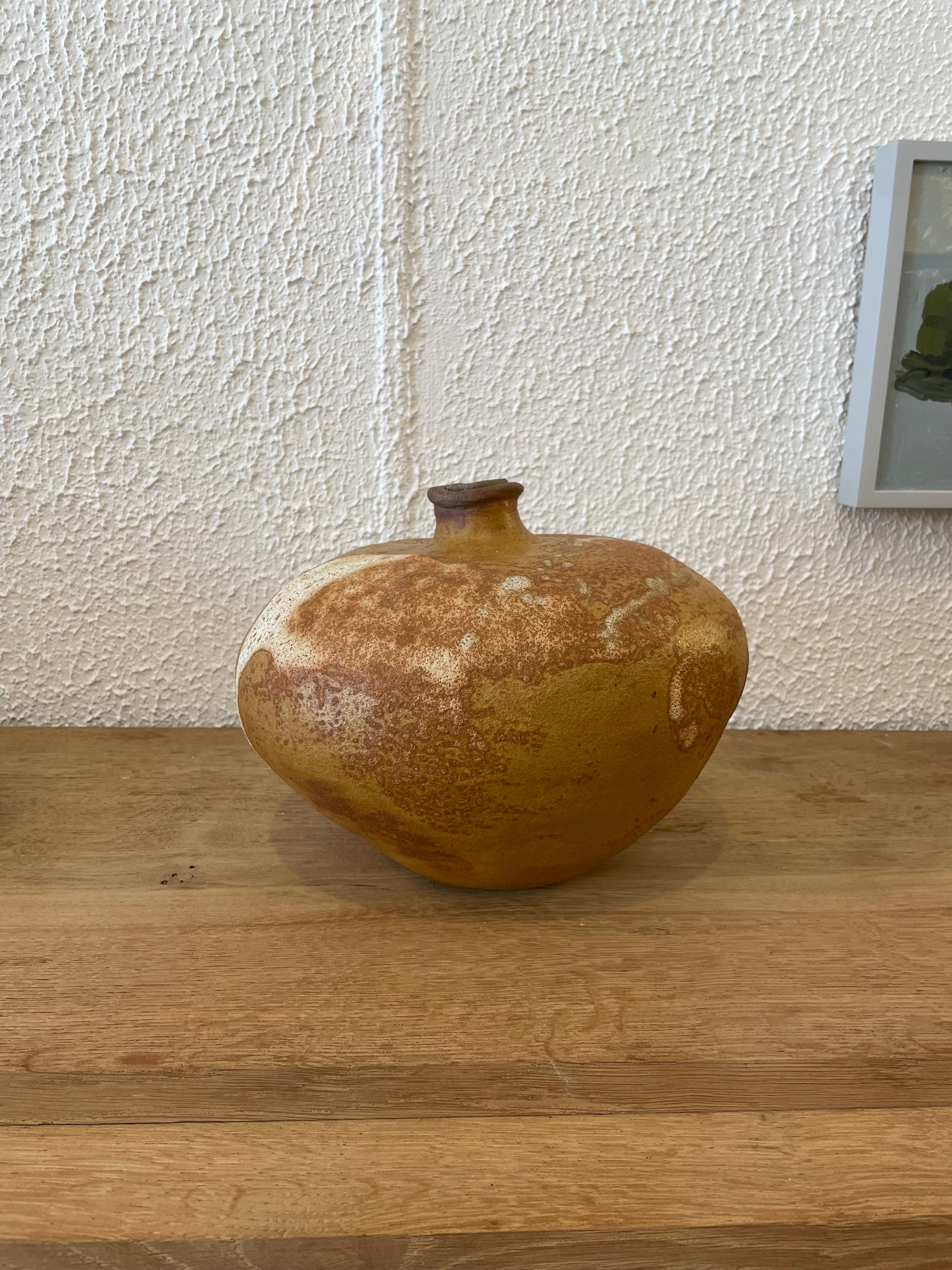 Neutral-toned sculptural ceramic vessel