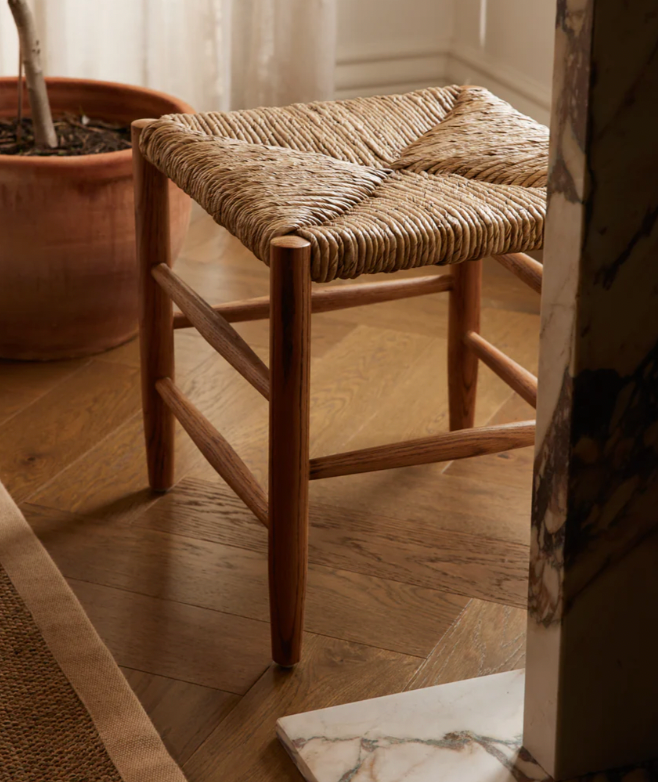 Dark oak stool with woven rush seat