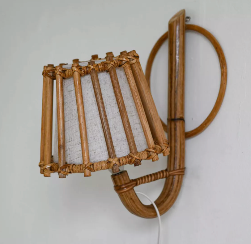 Parisian-inspired rattan and reed wall lamp