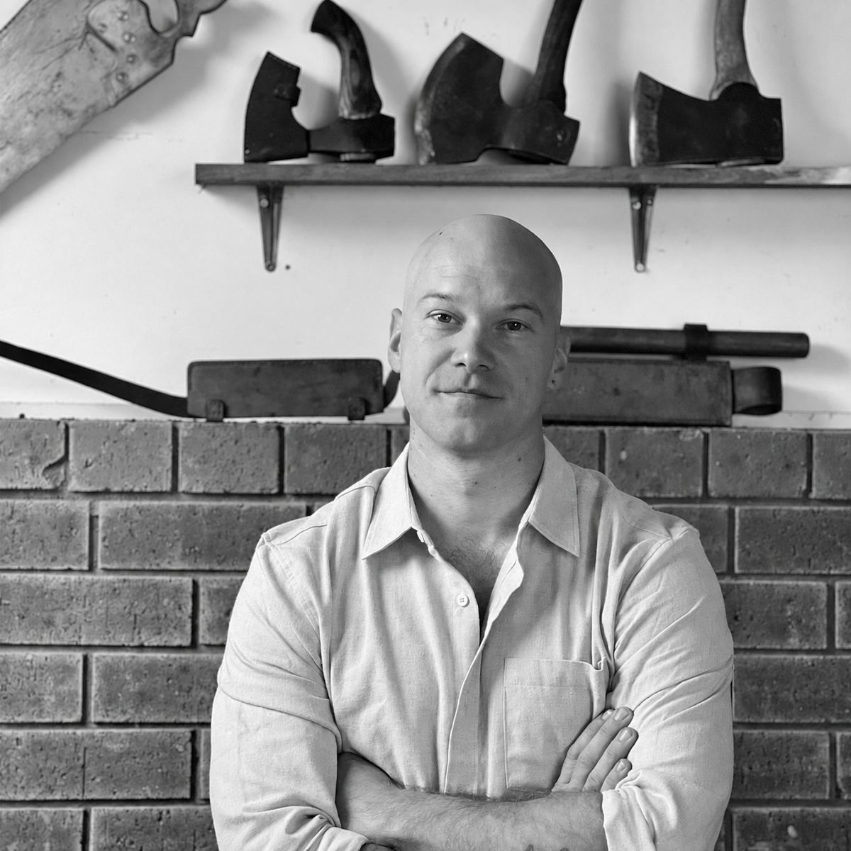 Luke Crouch in his Tasmanian furniture studio, black and white portrait
