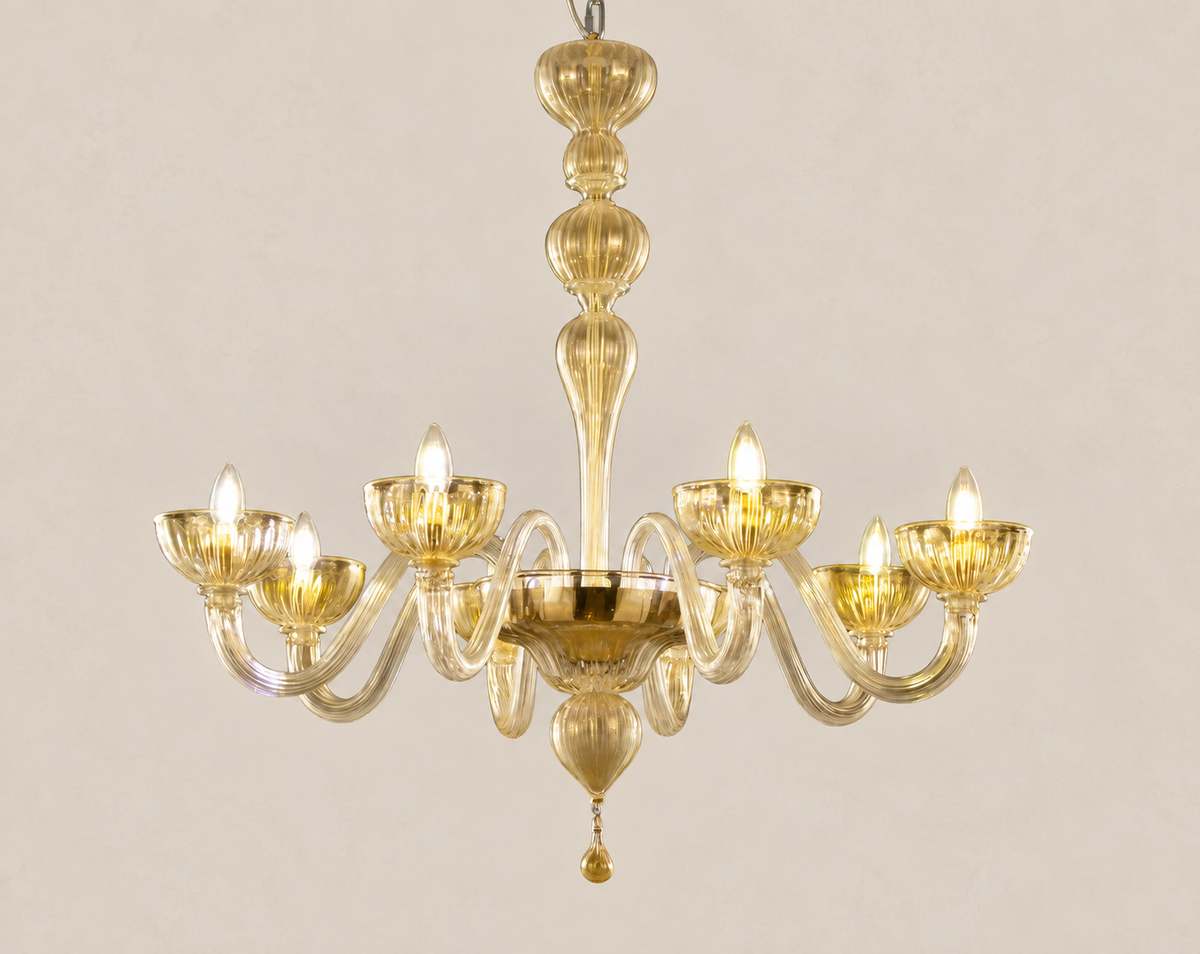 Gold Murano Glass Chandelier – 8 Lights on pale stone background