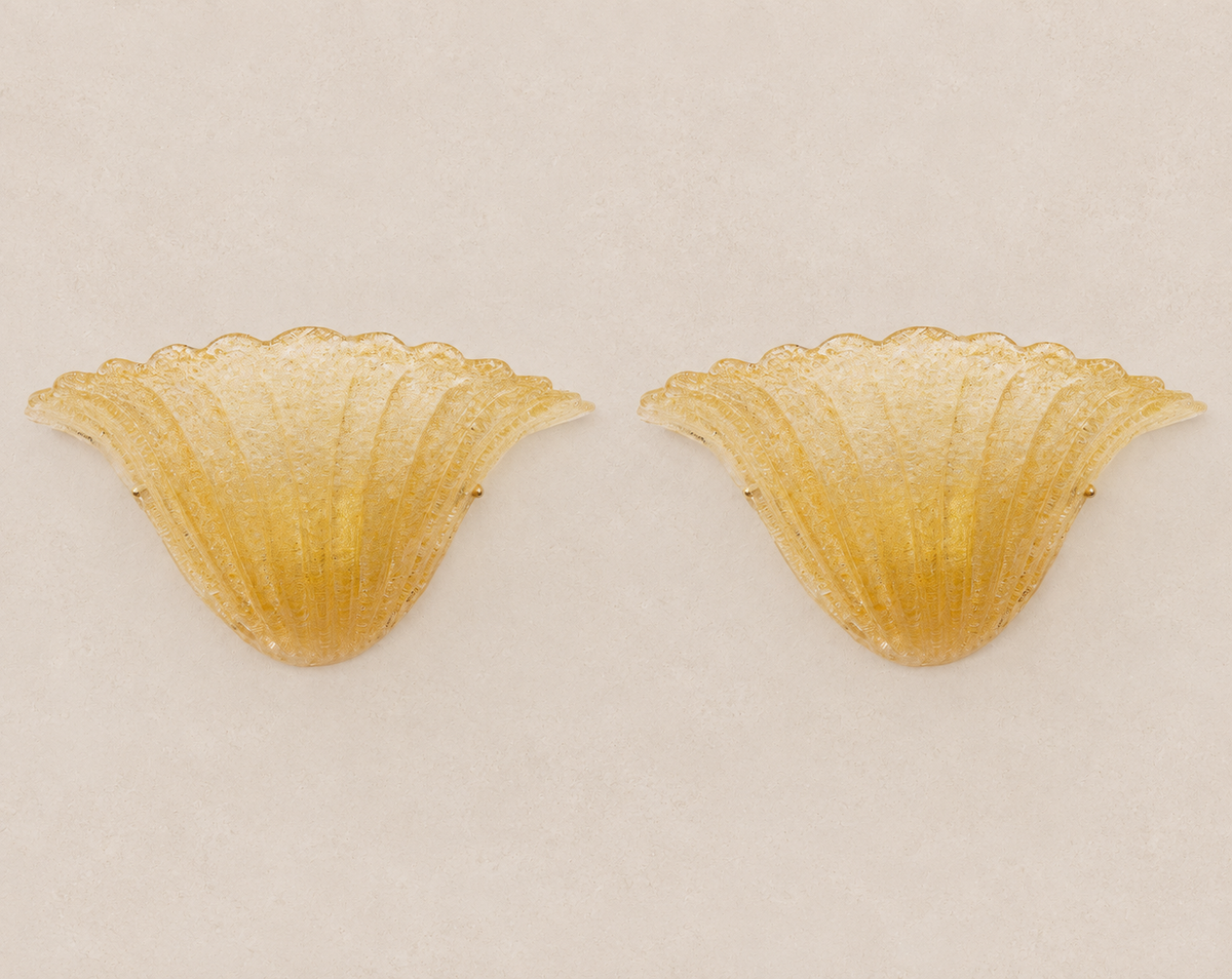 Amber Grit Murano Glass Wall Sconces – Pair on pale stone background