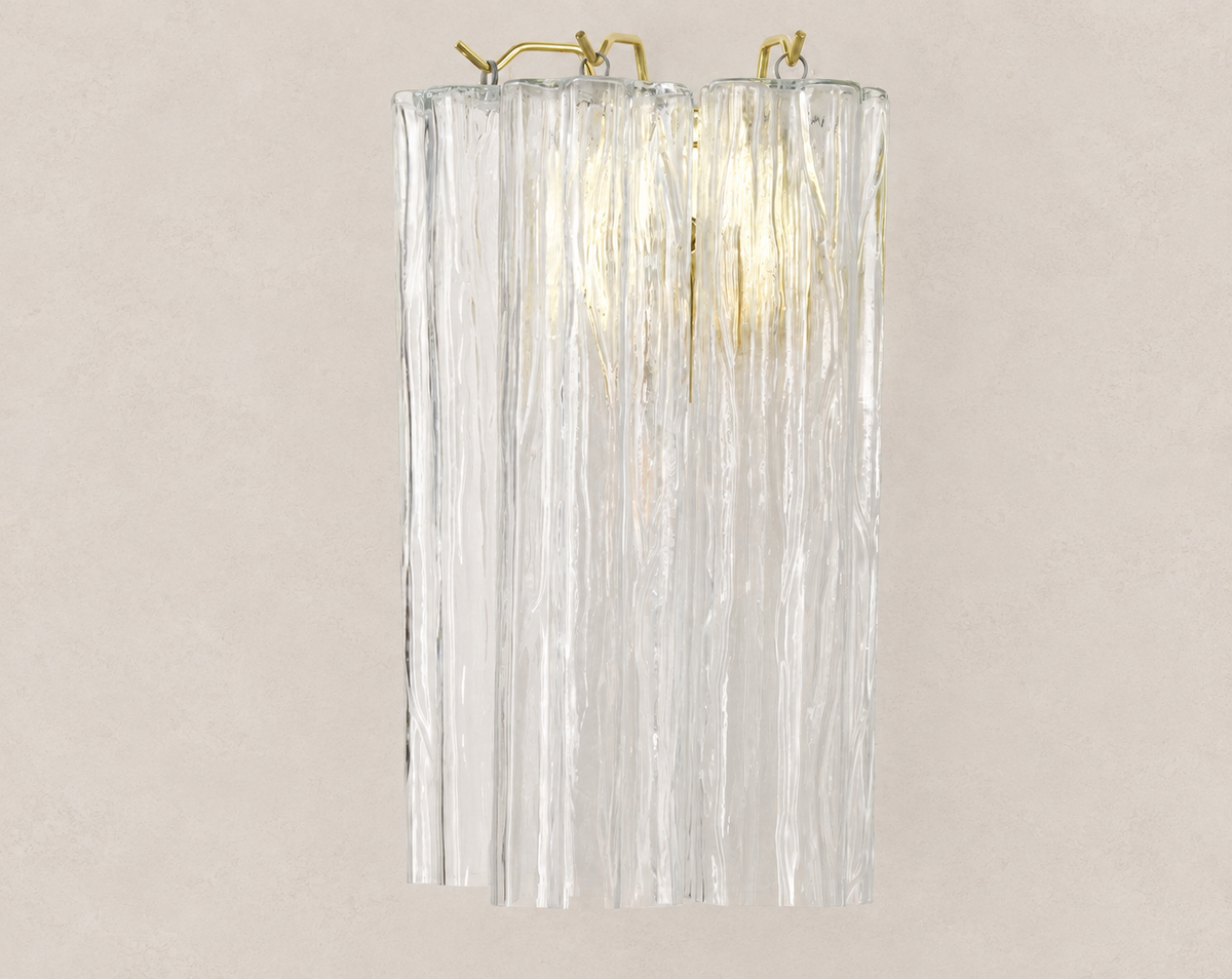 Clear Tronchi Murano Glass Wall Sconce on pale stone background