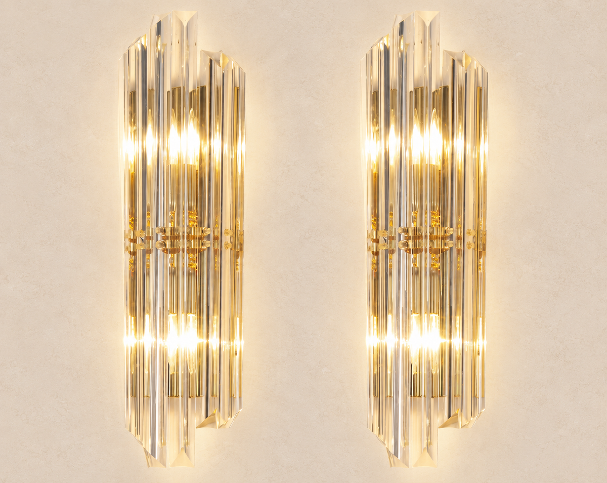 Tall Clear Triedri Murano Glass Wall Sconces – Pair on pale stone background
