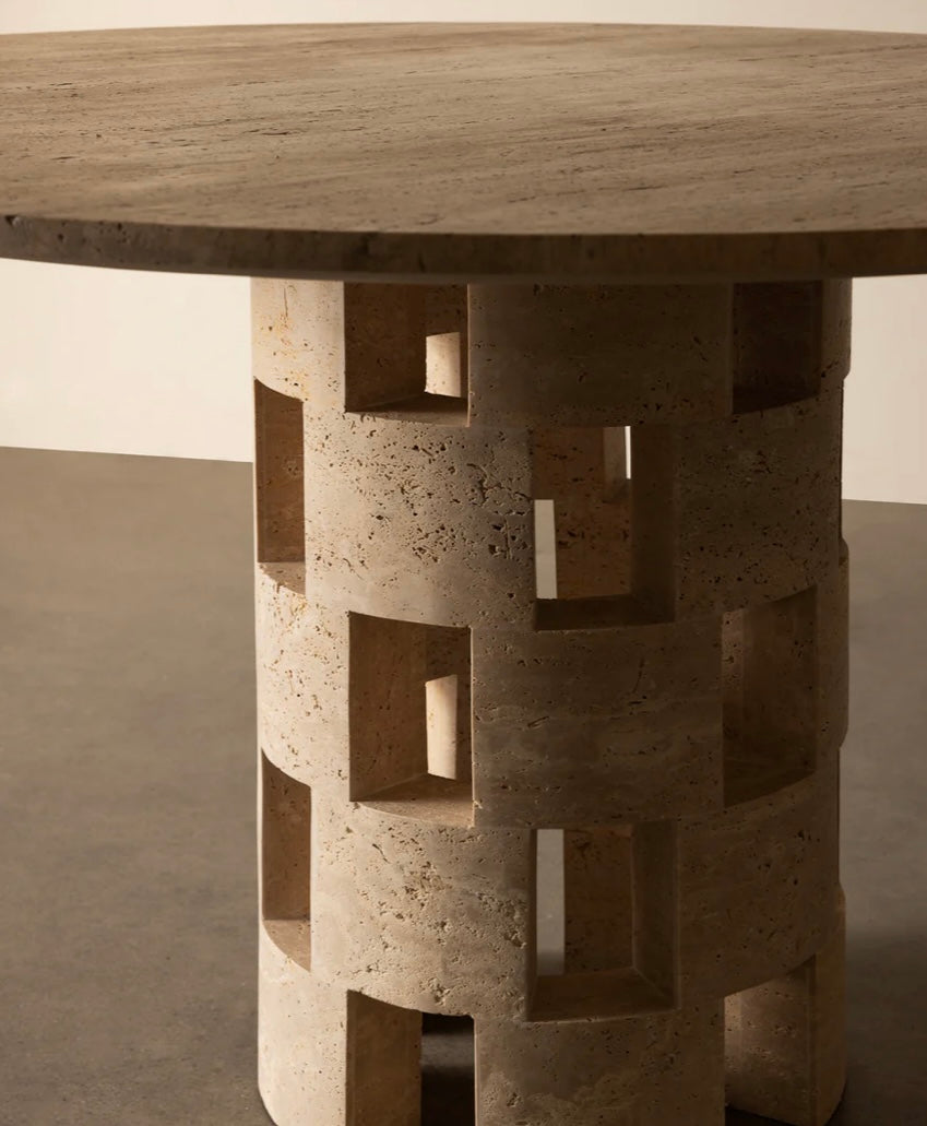 Modern stone dining table with architectural base