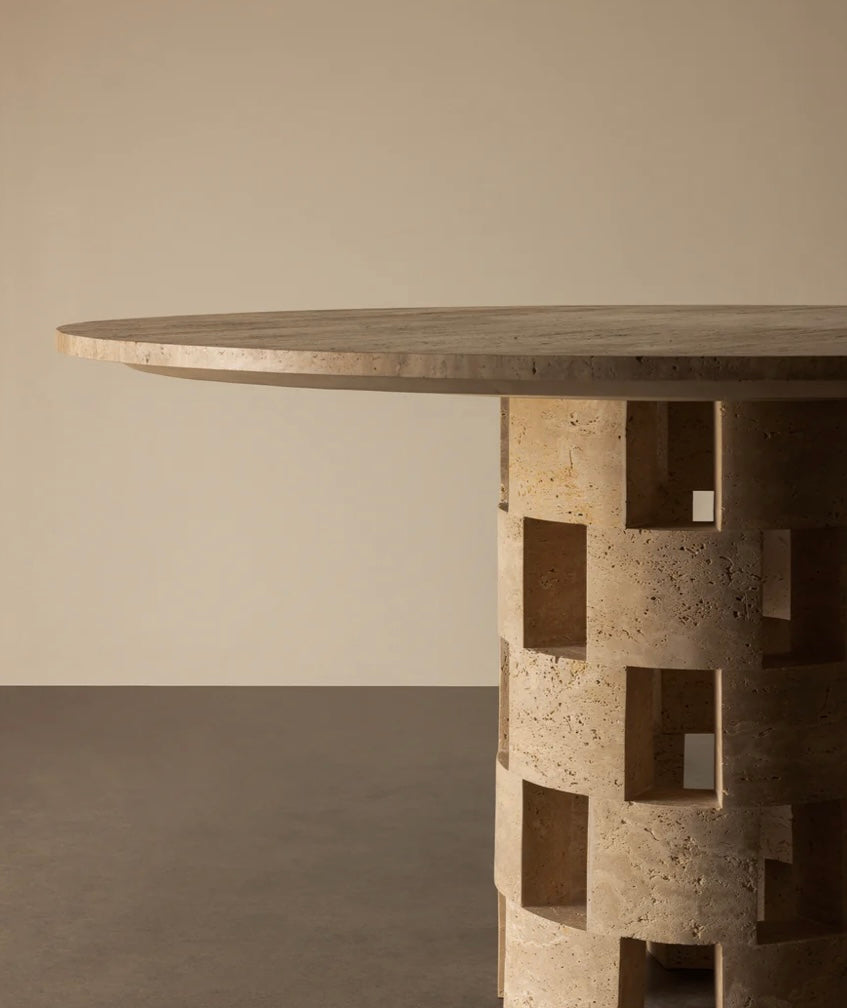 Sculptural travertine dining table with lattice design