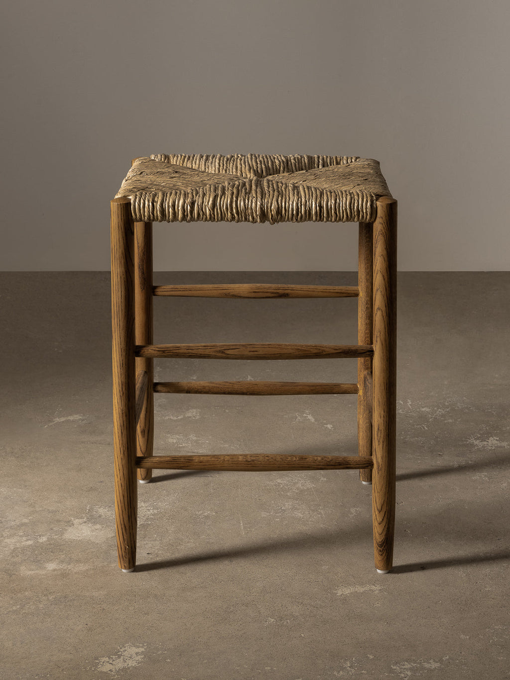 Arnaud Backless Counter Stool neutral background hero
