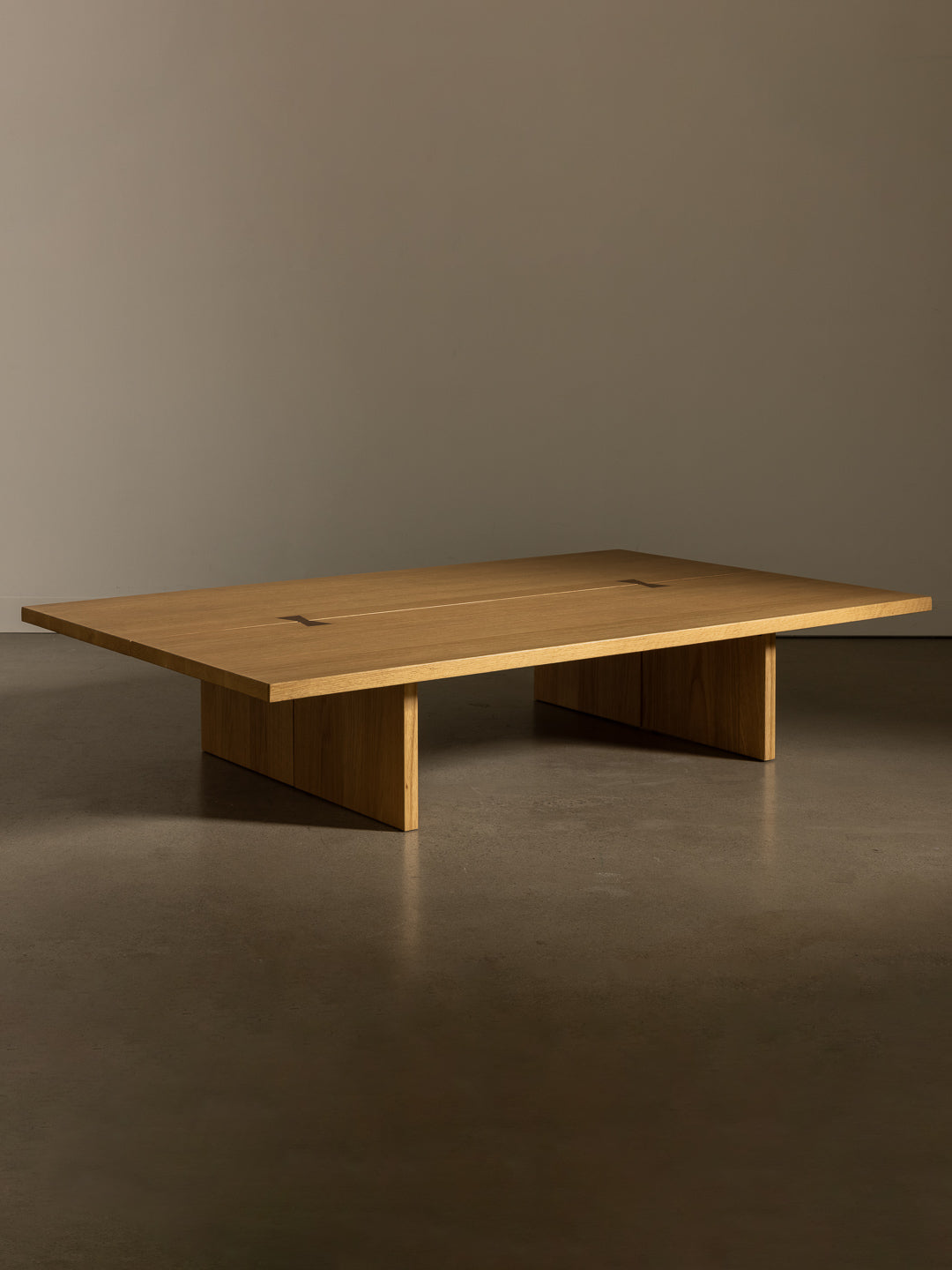 Bowtie coffee table on neutral studio background