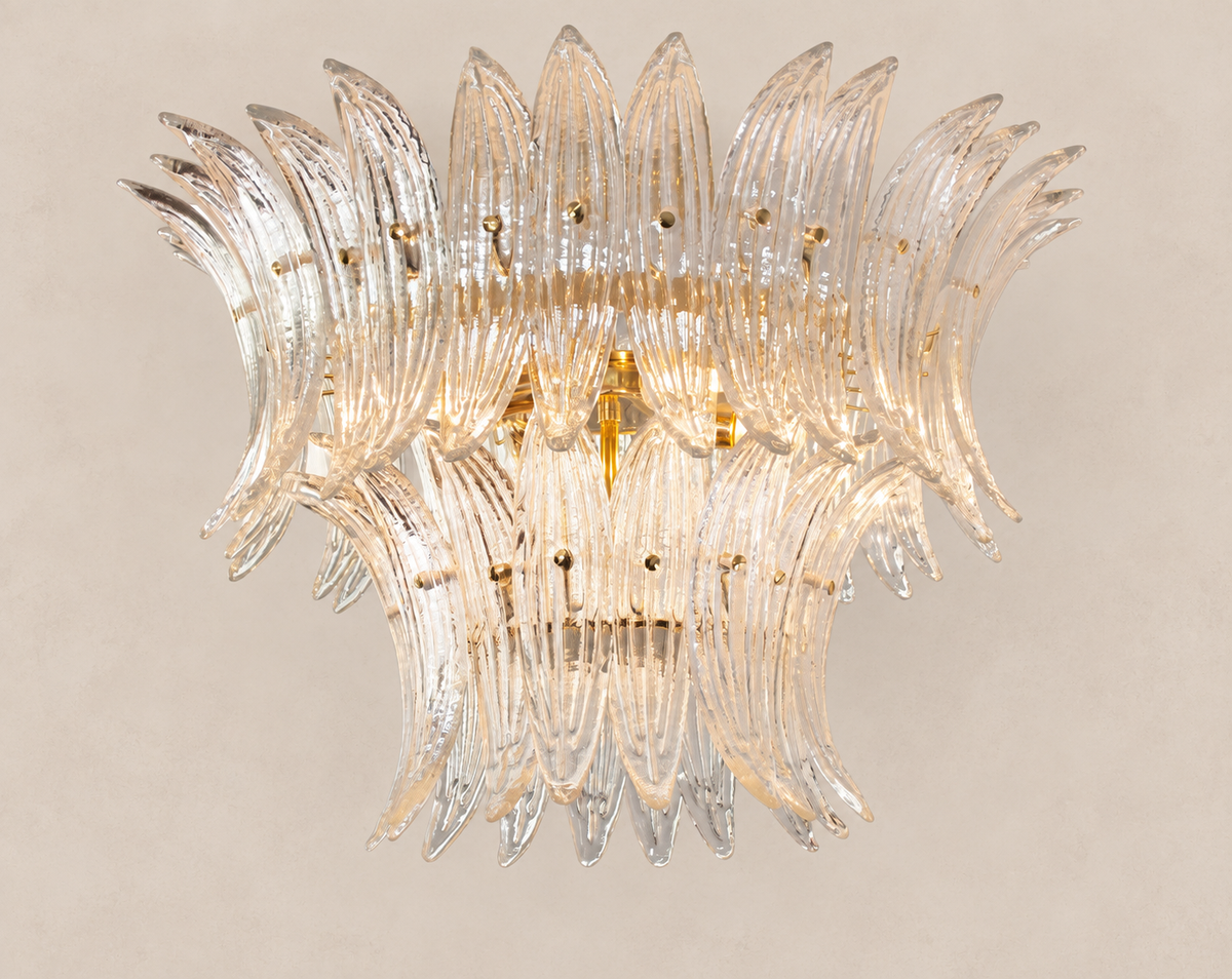 Clear Murano glass leaf ceiling light on pale stone background
