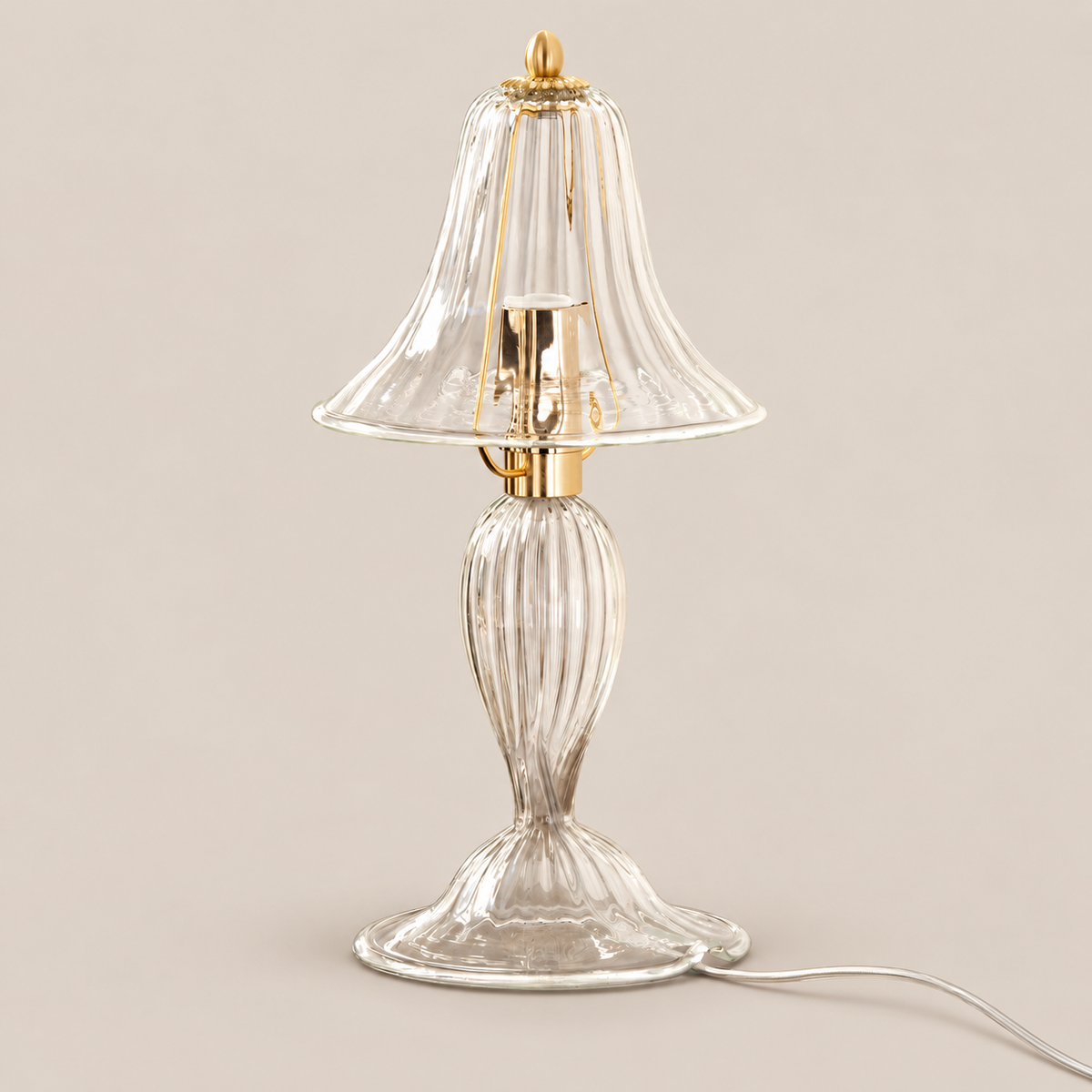 Decorative Murano glass table lamp on stone background