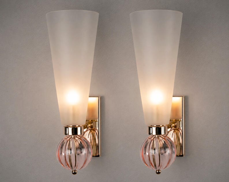 Pair of illuminated pink orb Murano wall sconces