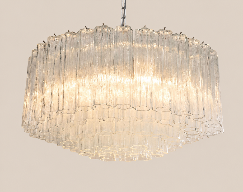 Three tier clear Tronchi Murano glass chandelier on stone