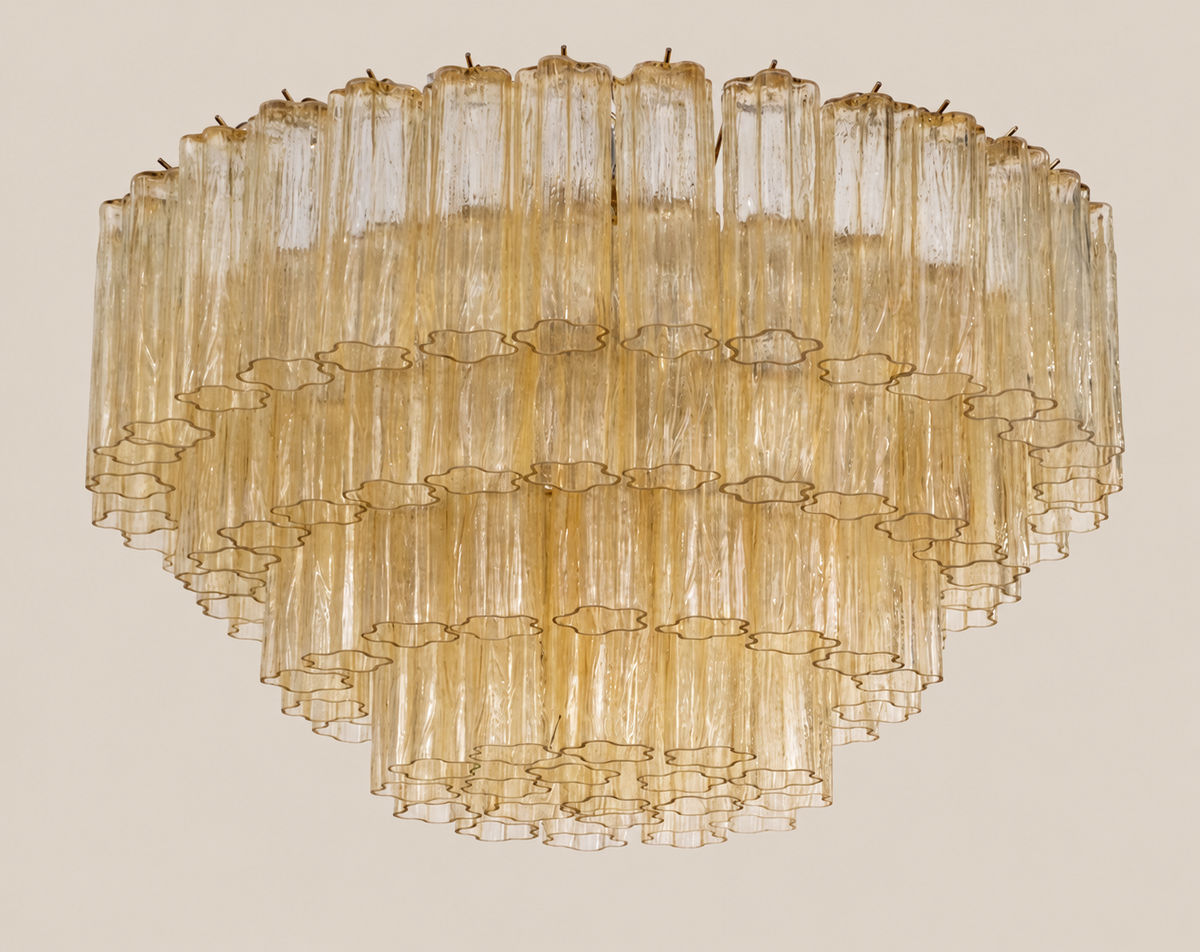 Four tier champagne Tronchi Murano glass ceiling light on stone